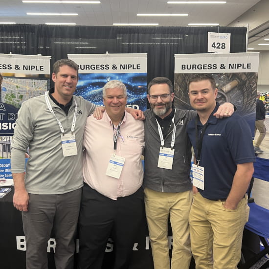 Employees showcasing a B&N conference booth